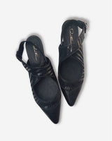 Zapato destalonado de cuero negro con hebilla lateral Pau Negro - Pia Martini Chile